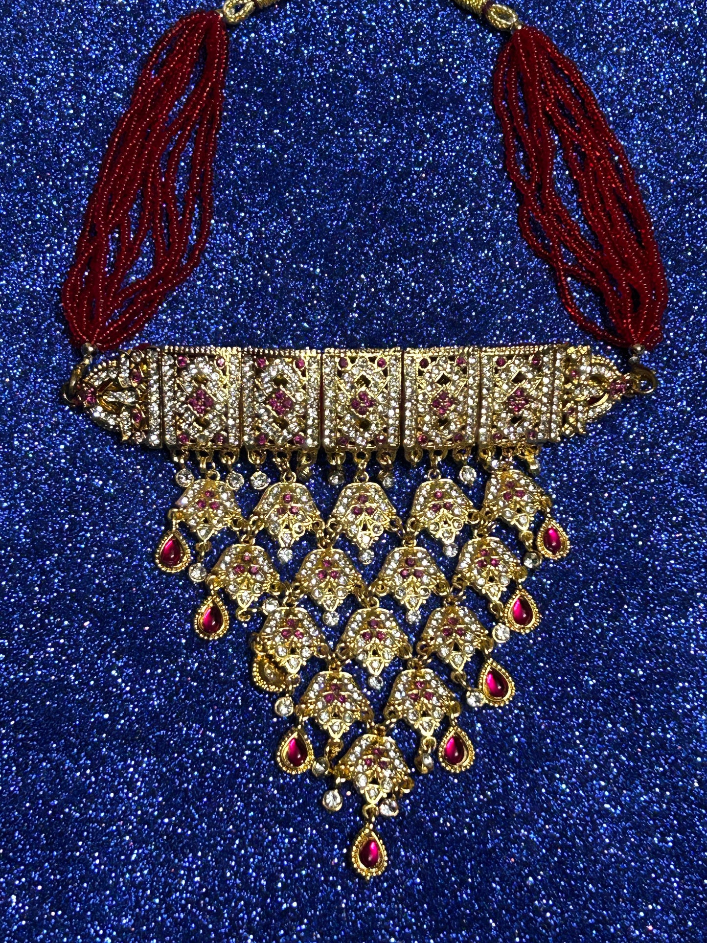 Red kundan and diamond necklace set with tops