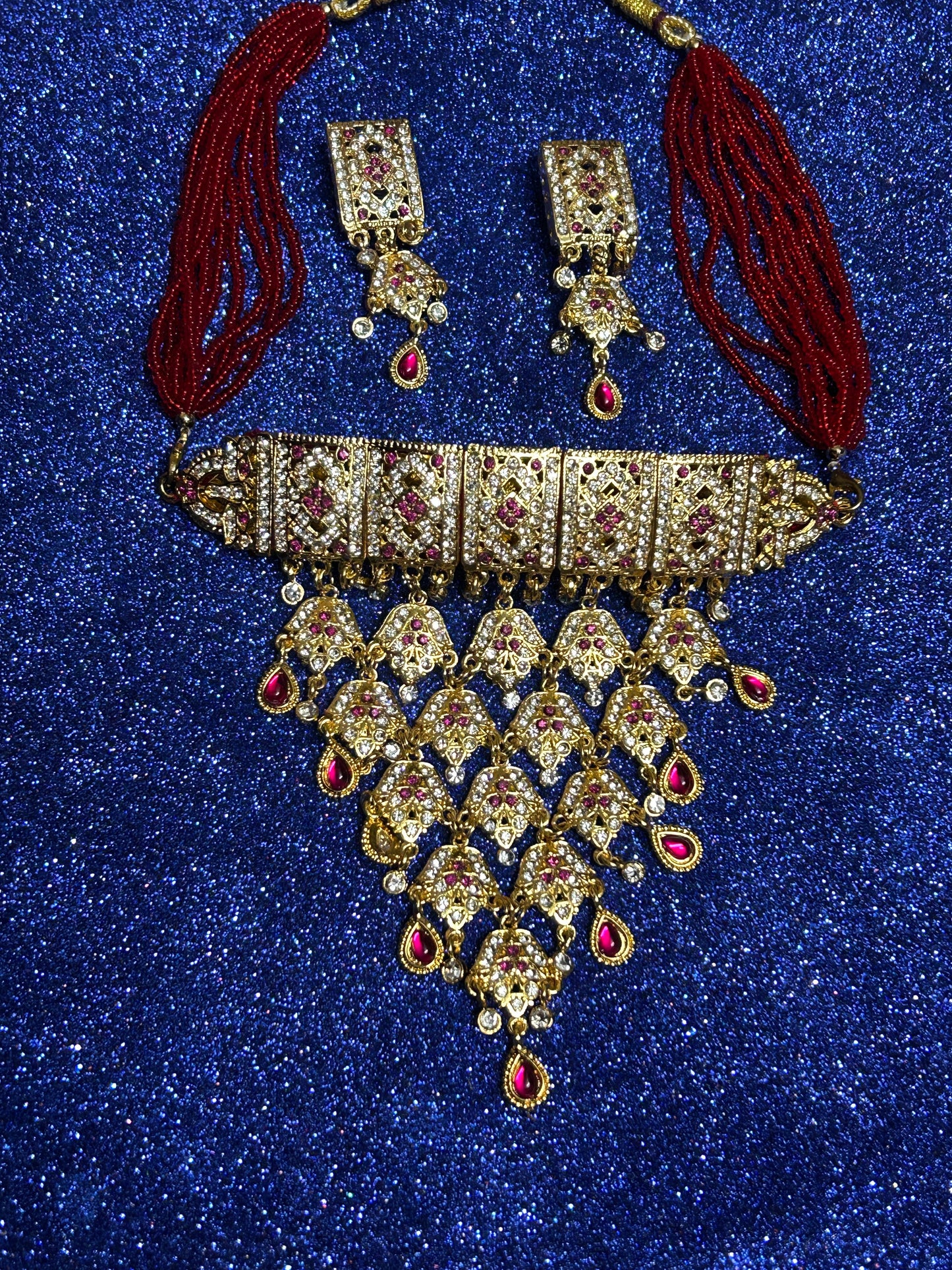 Red kundan and diamond necklace set with tops