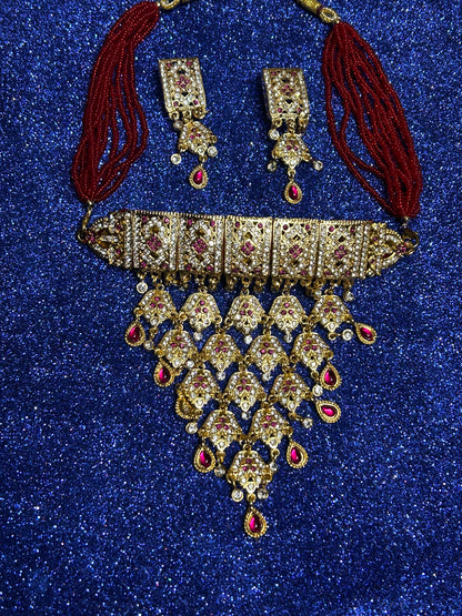 Red kundan and diamond necklace set with tops